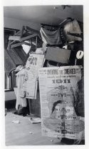 "Smearing the Smeared" 1911 poster and pile of furniture, Stanford University