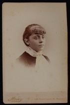 Portrait of young woman with lace scarf