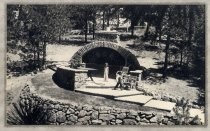 Children in front of large outdoor barbeque area by J. Roger Musick