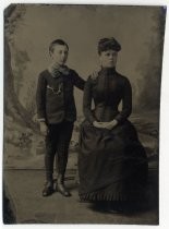 Portrait of boy and young woman