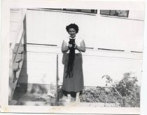 Yvonne Mendoza and cat Blackie, 1950