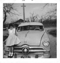 Lydia Sanchez and family car, 1960