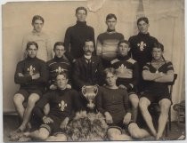 Cycling team with Leavitt & Bill trophy