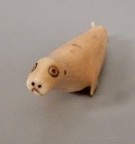 Seal and mouse figures