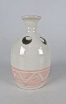 Candle vase with pink ornamentation