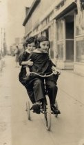 Lenore and Joyce Maxwell on tricycle