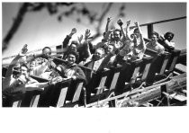 Riders on Great America roller coaster