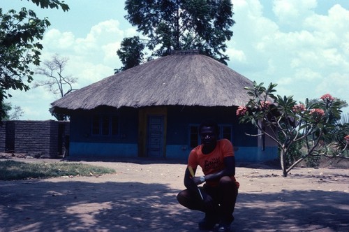 Man in front of his home at Kaputa, Northern Province