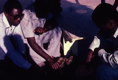 Men Playing "Chilolo", a game common in parts of Africa