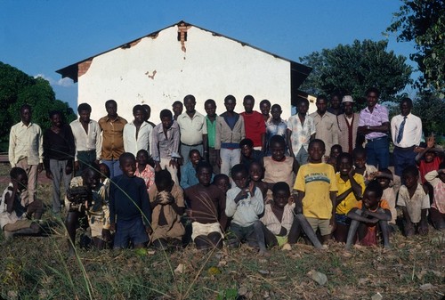 Group Photo outside school house, Puta