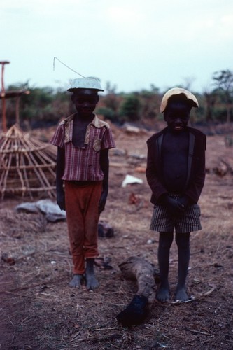 Two boys posing playfully for portrait, Mukupa Katandula