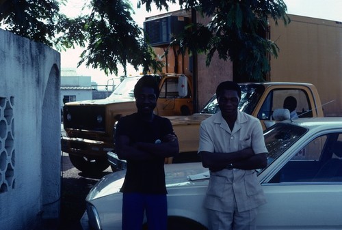 Portrait of two employees of Stanley Associates contractors in Kasama