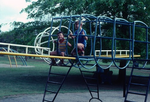 Children (Michael Cancel and Nicholas Bratton) play in park in Harare, Zimbabwe