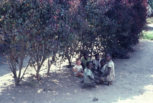 Portrait of group of neighborhood children with Daniel Cancel