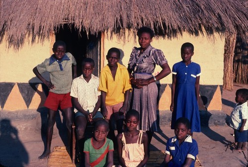 Portrait of Mr. Jameson Mpundu's children in front of his home at Mukupa Katandula village