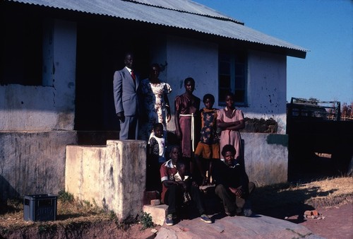 Portrait of Chief Puta, of the Bwile people, and his family, at his home/palace at Puta in Luapula District