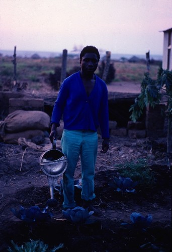 Gardener at home of Dutch medical volunteers, Kaputa