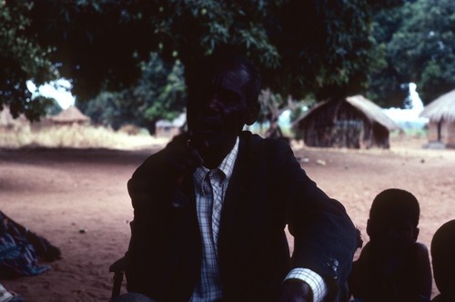 Mr. Isaac Kanyangala performing a story near his home in Mukupa Katandula village