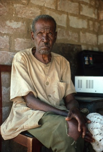 Bemba storyteller at Fele's village, Malole