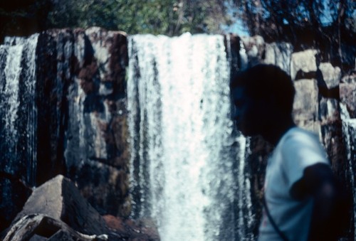 Mwaasha Falls, near village of Kaungu, with student Brilliant Kaungu in foreground