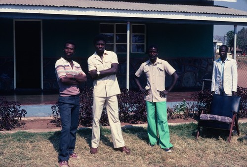 Government workers for the Fisheries Department in front of their offices at Nsama village