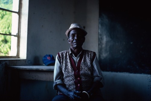 Bwile storyteller in school room, Puta