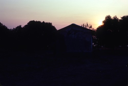 Sun sets behind the Fisheries offices at Nsama village