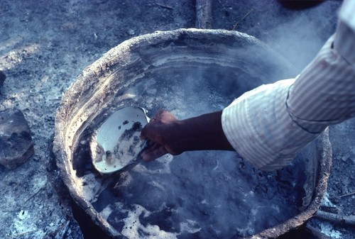 Boiling brine to make salt, Kaputa village