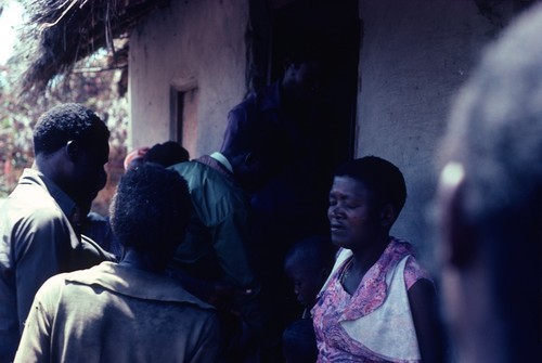 People entering a home at Kaputa village during the last day of a wedding ceremony