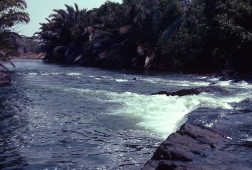 View of first stage of Chishimba Falls from behind falls