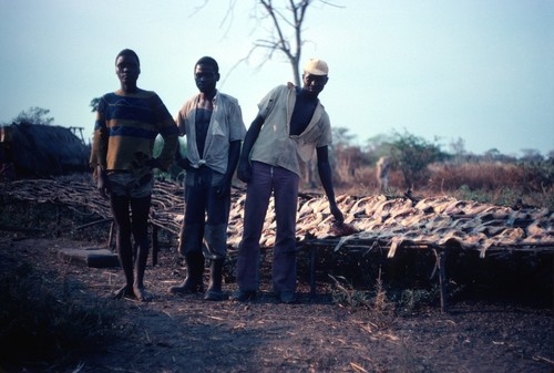 Fishermen at fish-drying racks at Kasongole fishing camp