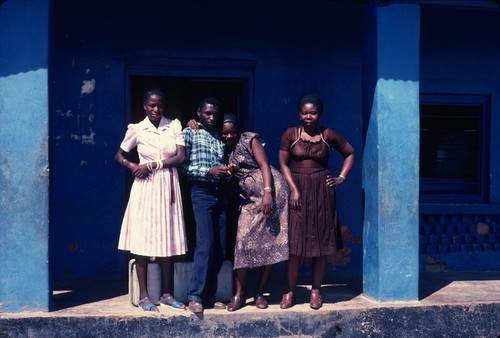 Shopkeeper with family at Nsama village