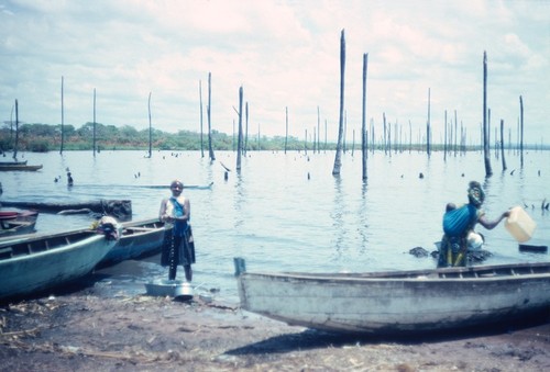 Women wash pots and draw water on Lake Mweru Wantipa