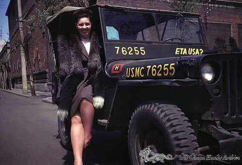 Ludmilla Luvdorski poses with military jeep