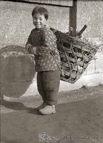 Collecting material to be used for cooking fuel in Tientsin, 1946