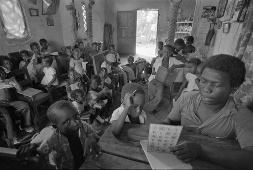 Teacher working with students in informal classroom, San Basilio de Palenque, ca. 1978