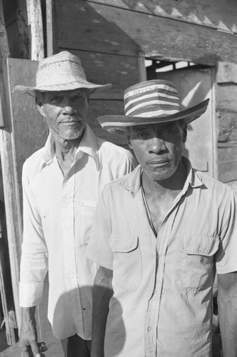 Men at city market, Cartagena Province, ca. 1978