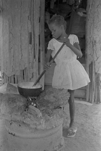 Girl stirring a pot, San Basilio de Palenque, ca. 1978