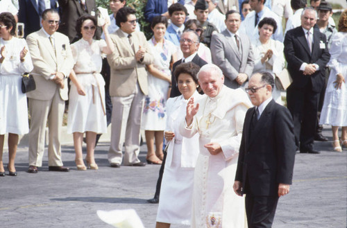 Pope John Paul II walking with President Álvaro Magaña and his wife, San Salvador, El Salvador, 1983