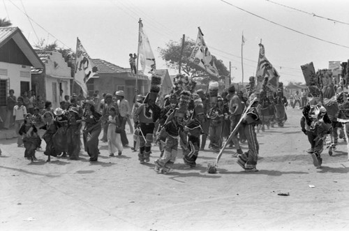 Dancers walking to the Carnival, Barranquilla, Colombia, 1977