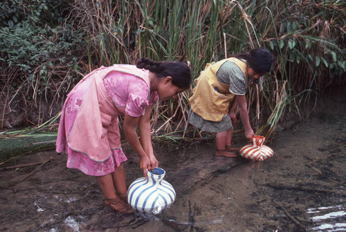 Guatemalan refugees at a river, Cuauhtémoc, 1983