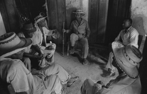 Men gather, San Basilio de Palenque, Colombia, 1977