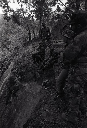 Claflin demonstrates rock climbing, Liberal, 1982