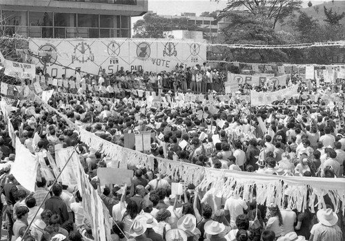 A large crowd at a campaign rally for presidential candidate Ángel Aníbal Guevara, Guatemala City, 1982