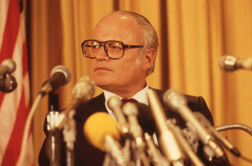 Ambassador Deane R. Hinton speaking at a press conference, San Salvador, El Salvador, 1982