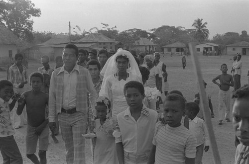 Wedding party walking in the street, San Basilio de Palenque, 1976