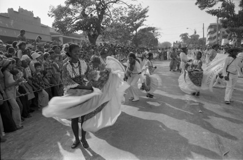 Dancers performing in the street, Barranquilla, Colombia, 1977