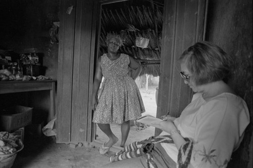 Nina S. de Friedemann taking notes, San Basilio de Palenque, ca. 1978