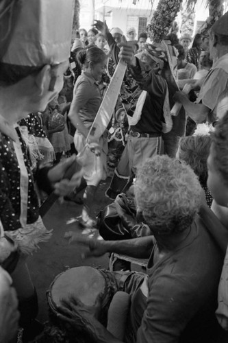 Dancers dancing among the Carnival crowd, Barranquilla, Colombia, 1977