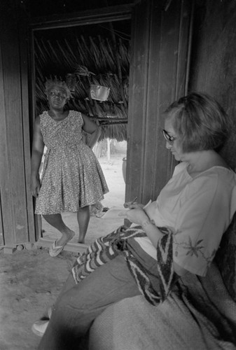 Nina S. de Friedemann taking notes, San Basilio de Palenque, ca. 1978